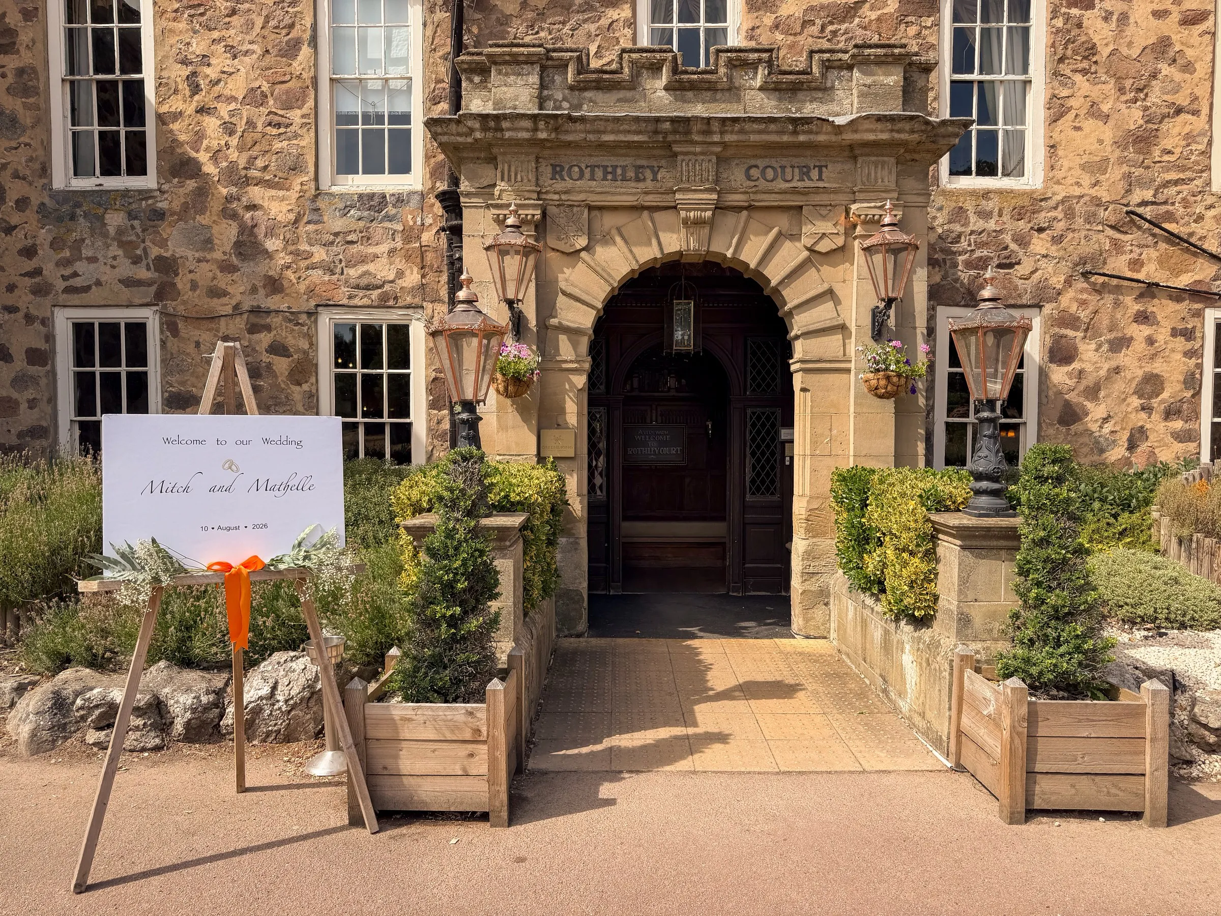 Rothley Court's entrance with the wedding welcome sign